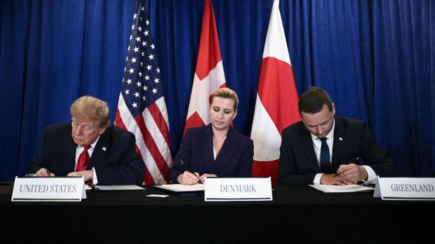 (L/R) US President Donald Trump, Denmark's Prime Minister Mette Frederiksen and Greenland's Prime Minister Jens-Frederik Nielsen sign a trilateral security deal on the sidelines of the 81st United Nations General Assembly in New York, on September 22, 2026. (Photo by Brendan SMIALOWSKI / AFP)