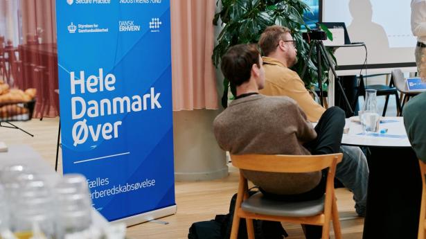 Billedet er fra TDC Erhverv og viser cybersikkerhedsinitiativet "Hele Danmark Øver".