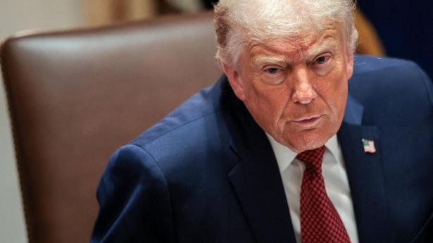 U.S. President Donald Trump attends a roundtable discussion on the day he announced an aid package for farmers, at the White House in Washington D.C., U.S., December 8, 2025. REUTERS/Jonathan Ernst