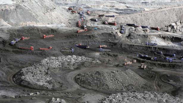 Kulminer i Kina, hvoraf flere ulovligt genåbnede, skaffer strøm til mining af bitcoin. Arkivfoto: Liu Xin/AP/Ritzau Scanpix