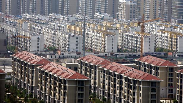 Boligsalget i Kina er gået i stå siden pandemien, og det har kastet ejendomssektoren ud i en dyb krise. Nu har krisen fået konsekvenser for en stor skyggebank. Arkivfoto: China Daily/Reuters/Ritzau Scanpix