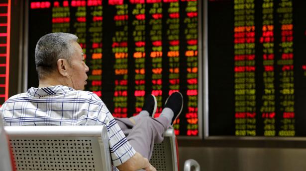 Investorer ser muligheder i billige kinesiske aktier. Arkivfoto: Jason Lee/Reuters/Ritzau Scanpix