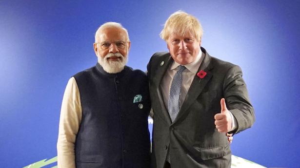 Premierminister Boris Johnson, vært for COP26, og hans indiske kollega, Narendra Modi, inden et bilateralt møde. Foto: Stefan Rousseau/Pool/AFP/Ritzau Scanpix
