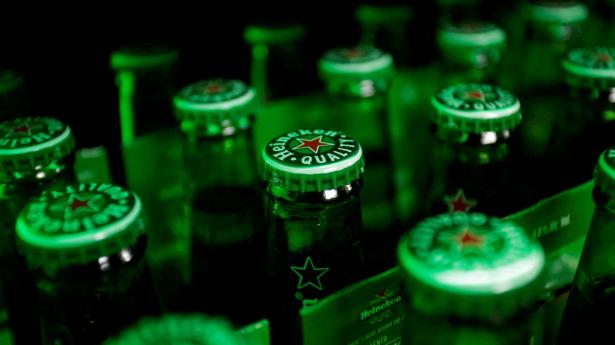 FILE PHOTO: Heineken beer bottles are seen at a bar in Monterrey, Mexico June 20, 2017. REUTERS/Daniel Becerril/File Photo