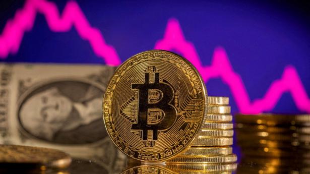 Værdien af bitcoin er dykket kraftigt over det seneste år, og nogle spekulerer i kollaps i kryptomarkedet. Arkivfoto: Dado Ruvic/Reuters/Ritzau Scanpix
