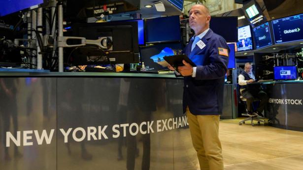 Børshandlere på Wall Street er afhængige af at få nyhederne først, hvis de vil tjene penge. Arkivfoto: Angela Weiss/AFP/ Ritzau Scanpix