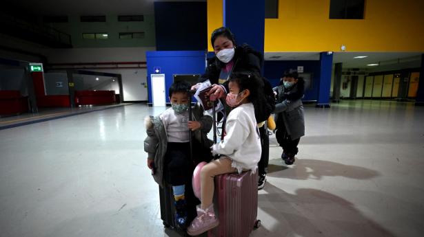 I det nye år skal man blot aflevere en negativ coronatest, når man rejser ind i Kina.
Foto: Filippo Monteforte/AFP/Ritzau Scanpix
