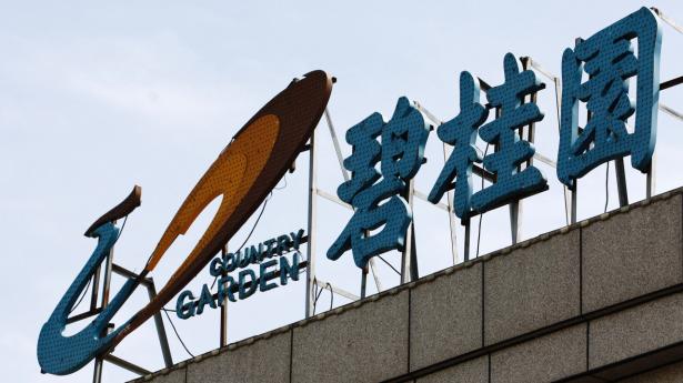 Den kinesiske ejendomsudvikler Country Garden kan ikke ånde lettet op. Der venter flere problemer forude, vurderer to økonomer. Arkivfoto: Tingshu Wang/Reuters/Ritzau Scanpix