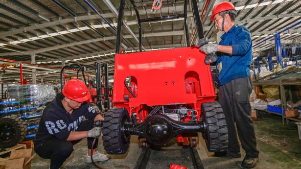 Der er tilbagegang i den kinesiske industri. Det skyldes i høj grad, at den globale industrisektor er i recession. Arkivfoto: AFP/Ritzau Scanpix