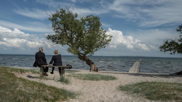 Ældre, der dropper stranden og golfbanen til fordel for arbejdsmarkedet, risikerer at miste deres garanterede afkast på kapital- og alderspensionen. Foto: Søren Lorenzen/Ritzau Scanpix