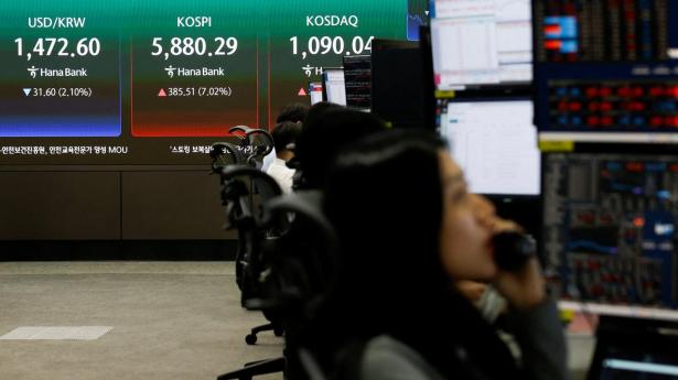 Aktier i Asien: Investorer afventer megacap regnskaber og centralbank-beslutninger