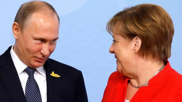 EU overvejer Angela Merkel eller Mario Draghi som mulig Putin-hvisker