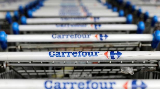 Carrefour sænker forventningerne efter uro i hjemlandet