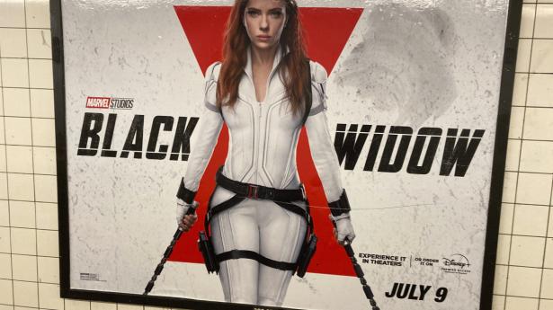 Photo by: STRF/STAR MAX/IPx 2021 6/27/21 Black Widow, starring Scarlett Johansson, is set to be released on Disney Plus Premier Access on July 9th for $30.00 Here, a 'Black Widow' poster is seen in a subway station in Manhattan.