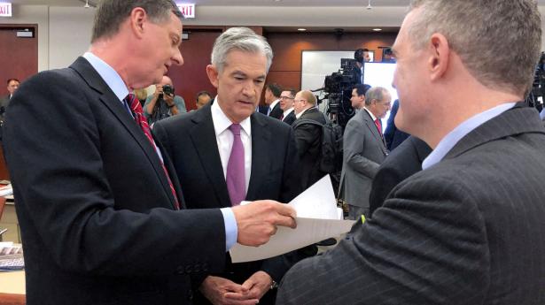 Federal Reserves formand Jerome Powell (i midten) og St. Louis-direktøren James Bullard (til højre) er nu på samme sider i forhold til kommende renteforhøjelser.