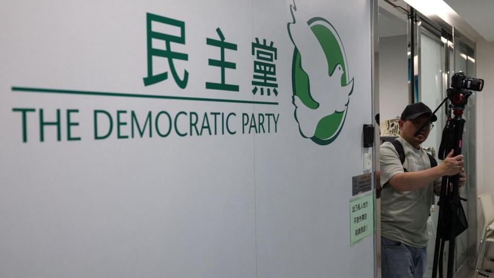 The logo of the Democratic Party is seen at its office, in Hong Kong, China, April 13, 2025. REUTERS/Tyrone Siu