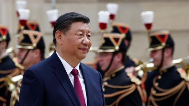 Xi i Paris: Ønsker fred og maner til handelsro